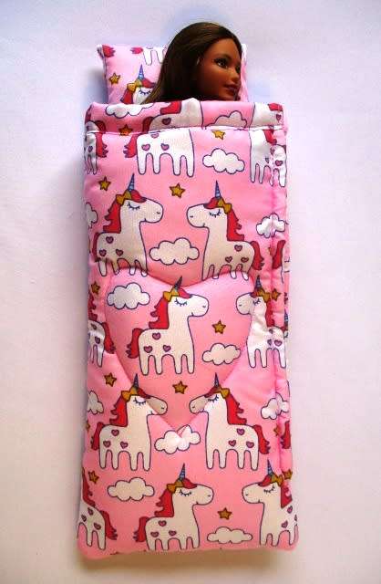 Barbie doll`s sleeping bag - unicorn clouds