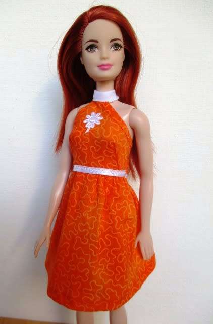 Barbie doll`s halter neck dress - orange white daisy
