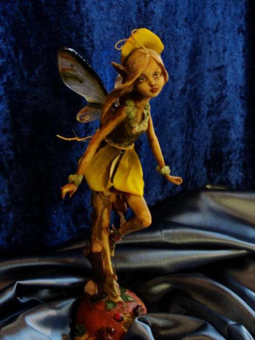 Fairy Dancing on a Apple