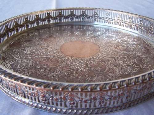 plated tray ...  a round, heavy one !!!