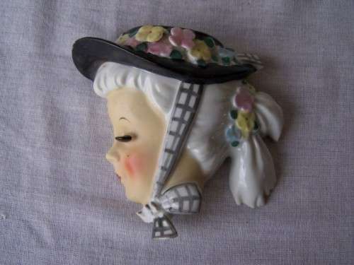 head ... of a wall pocket lady !!!