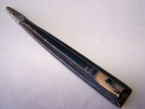 scissors ... in a scabbard