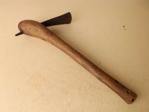 adze ... for carving maybe !!!