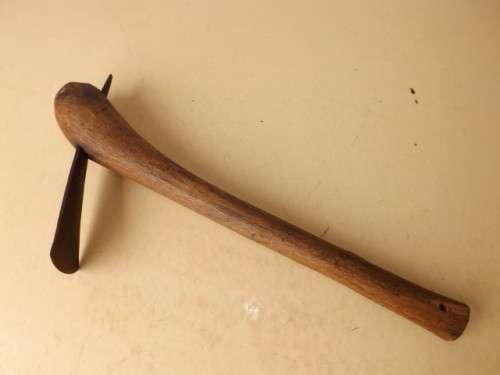 adze ... for carving maybe !!!