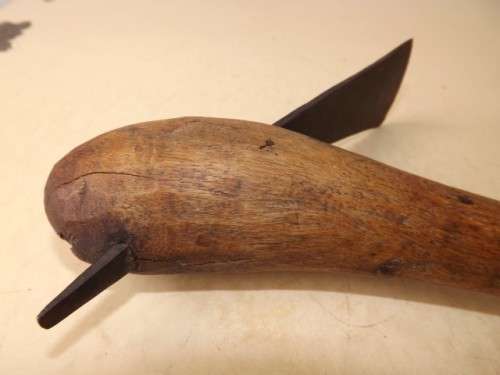 adze ... for carving maybe !!!