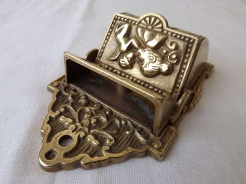 interesting wall container possibly for matches ... of brass !!!