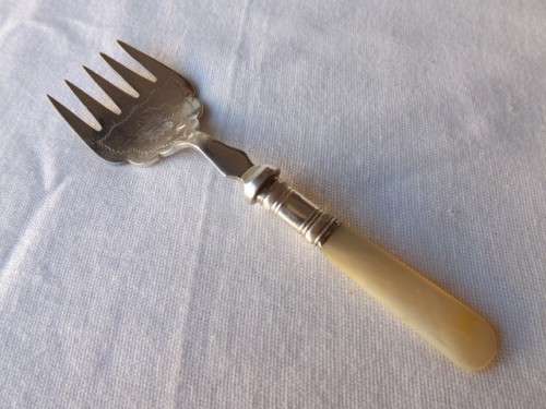 fork ... with a mother of pearl handle !!!