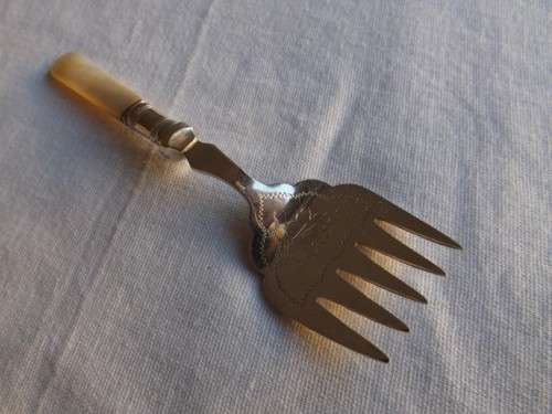 fork ... with a mother of pearl handle !!!