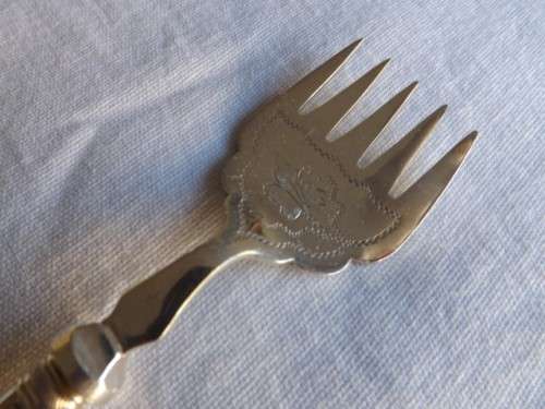 fork ... with a mother of pearl handle !!!