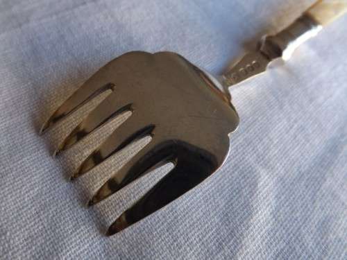 fork ... with a mother of pearl handle !!!