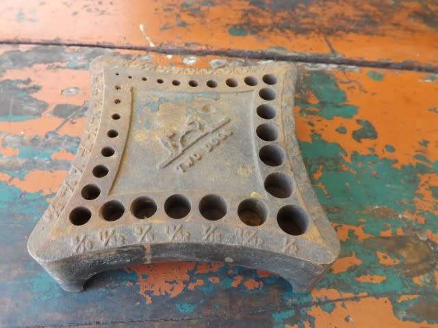 stunning cast iron stand ... for drill bits !!!