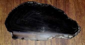 Black Agate Slice   provide prosperity and courage.