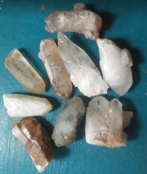 9 rough small Clear Quartz points