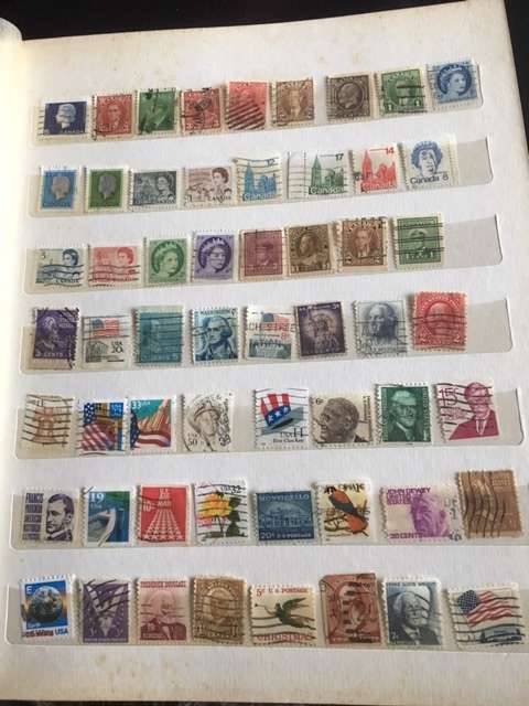 Stamp album with approx 800 stamps.