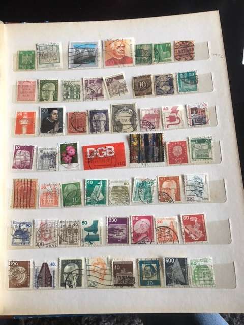 Stamp album with approx 800 stamps.