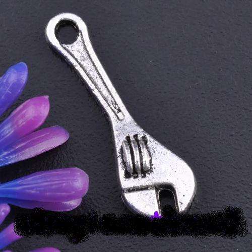 TIBETAN SILVER WRENCH CHARM