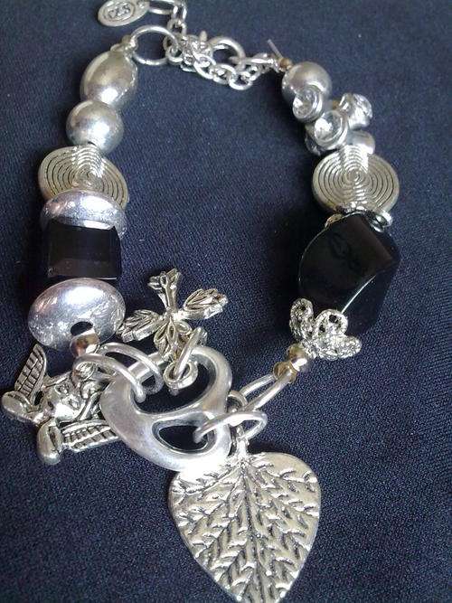 *R160* EXCLUSIVELY FROM THE 2010 HADASSAH COLLECTION  TIBETAN SILVER CHARMS BRACELET
