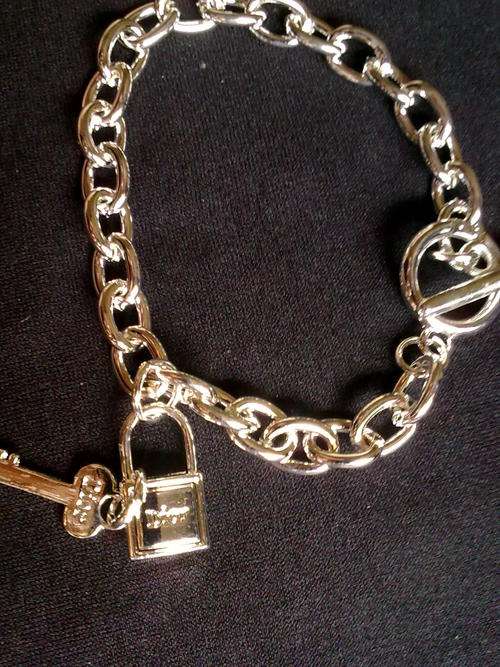 EXCLUSIVELY FROM THE HADDASAH COLLECTION  SILVER ELECTROPLACED KEY LOCK BRACELET