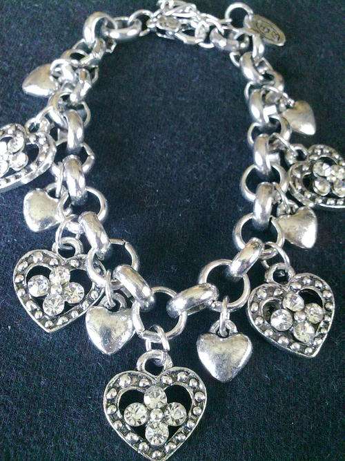 EXCLUSIVELY FROM 2011 HADASSAH COLLECTION TIBETAN SILVER  ROLO HEART CHARMS BRACELET