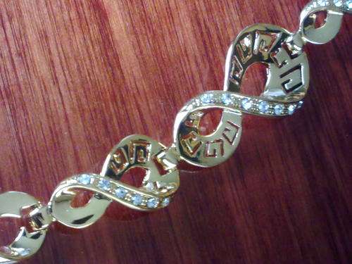 CLEARANCE SALE!!!! 2 YEAR GUARANTEE!!GORGEOUS WIDE GOLD DIAMANTE BRACELET 18 mm