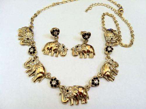 Clearance SALE!!!!2 YEAR GUARANTEE!! GOLD ELEPHANT, WHITE&BLACK DIAMANTE NECKLACE AND EARRINGS SET