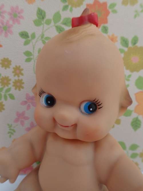 Kewpie Doll Sitting Posture
