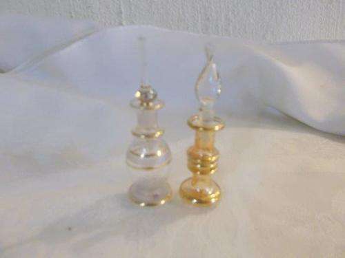 Two very lovely small glass perfume bottles