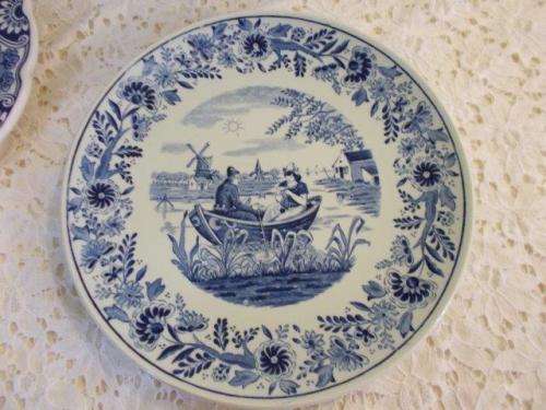 Nice small blue and white delft wall plate with boating scene