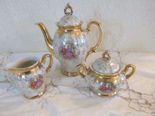 lovely mother of pearl luster style , romantic scene tea pot and milk and sugar bowl