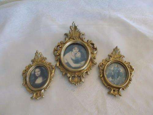 Three small vintage hard plastic ornate frames