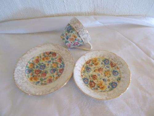 last one chintz style empire shelton ivory tea cup trio