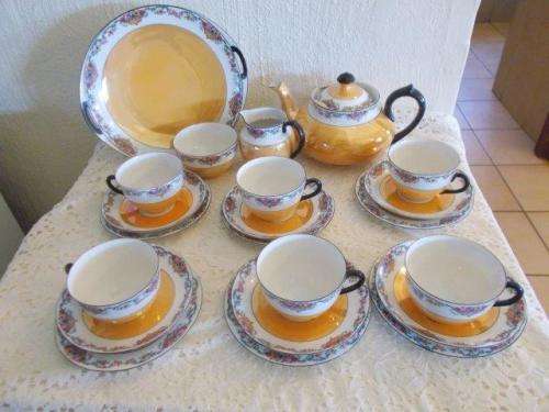 stunning 22 piece Czechoslovakia luster orange tea set