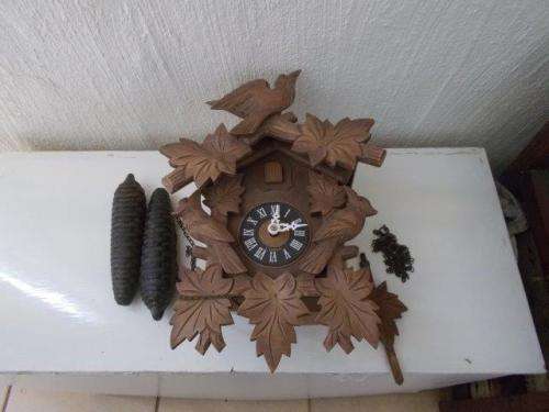 vintage wooden cuckoo clock will be sold as is