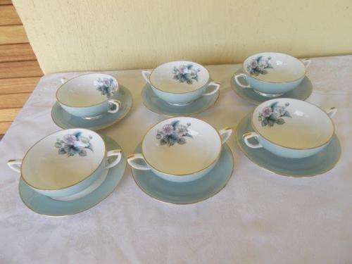 A set of six Royal worcester soup bowl mugs and saucers