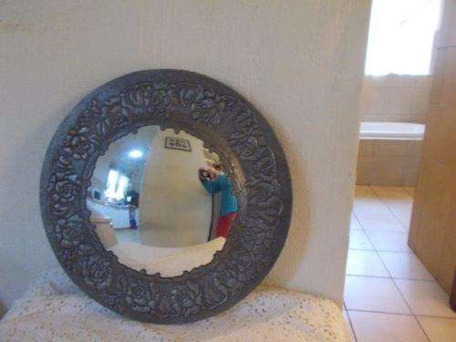 Stunning vintage pewter convex glass wall mirror