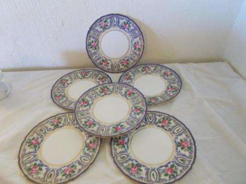 Vintage set of six Royal doulton plates