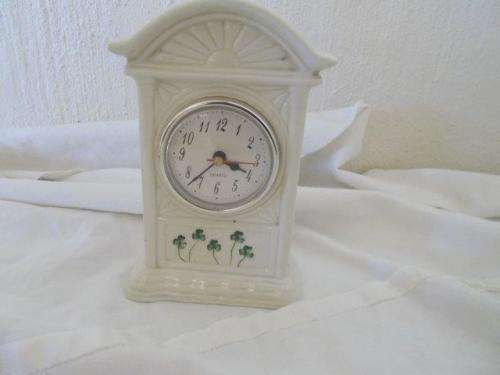 nice battery operated porcelain clock in working order