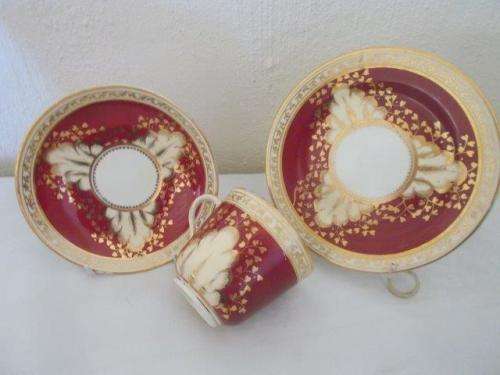 Stunning vintage maroon and gold tea cup trio
