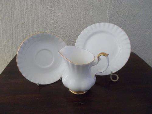plain white and gold royal albert val d'or milk jug and side plate and saucer combo