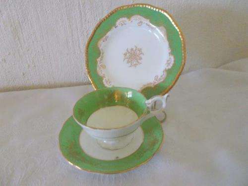 pretty green and gold tea cup trio