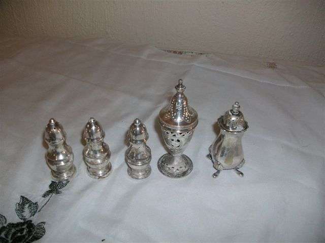 collection of silver plated salt and pepper pots