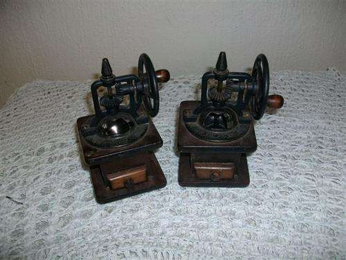 Two vintage wooden pepper grinders