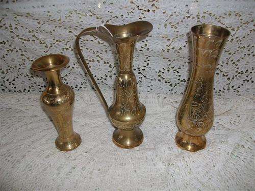 collection of three brass vases