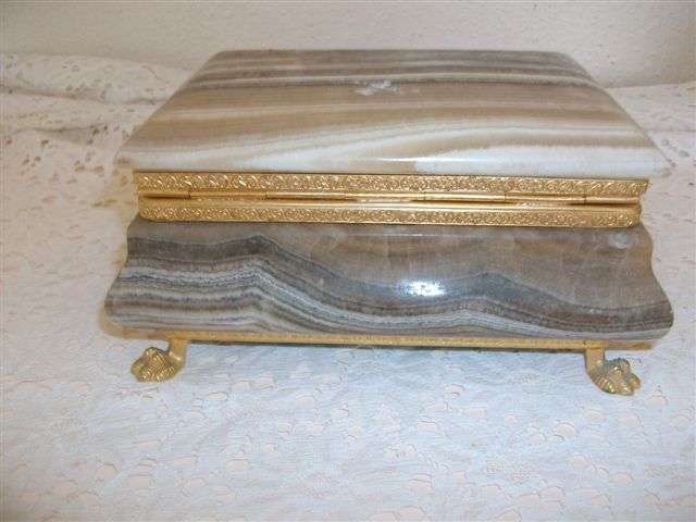 Large stone with orante brass feet trinket box