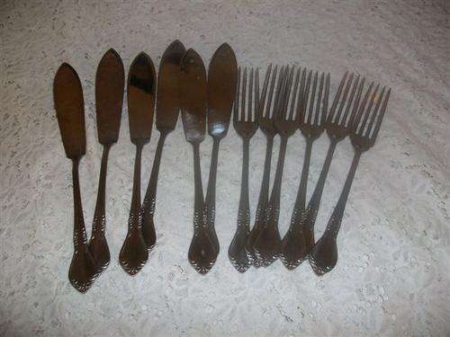 Set of sliver plated fish knifes and forks