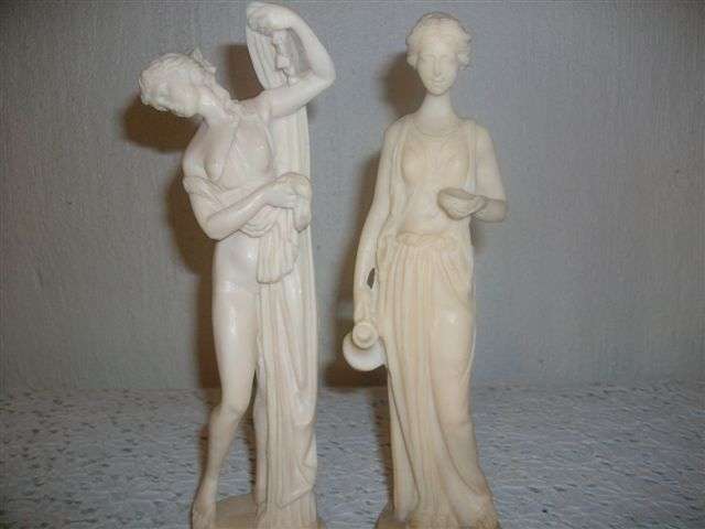 Two resin lady figurines