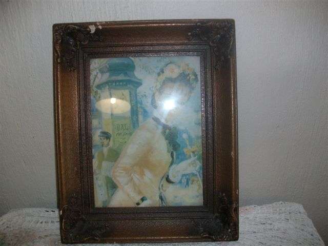 Ornate vintage victorian frame with victorian lady picture behind glass