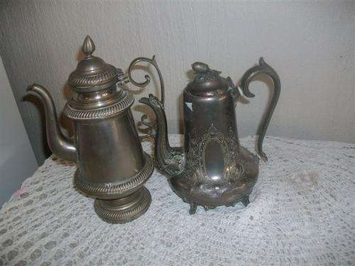 Two lovely vintage silver plated teapots up for sale please note