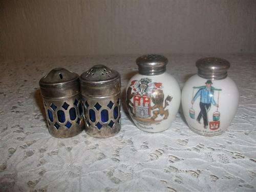 Two sets of salt and pepper sets one sliver plated and other