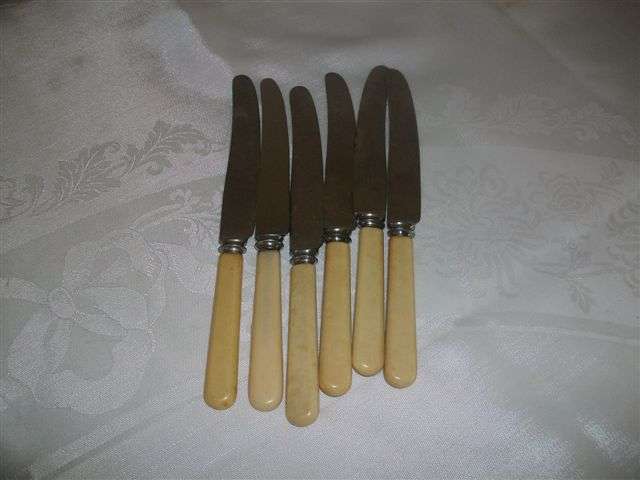 Six vintage bone handle knifes